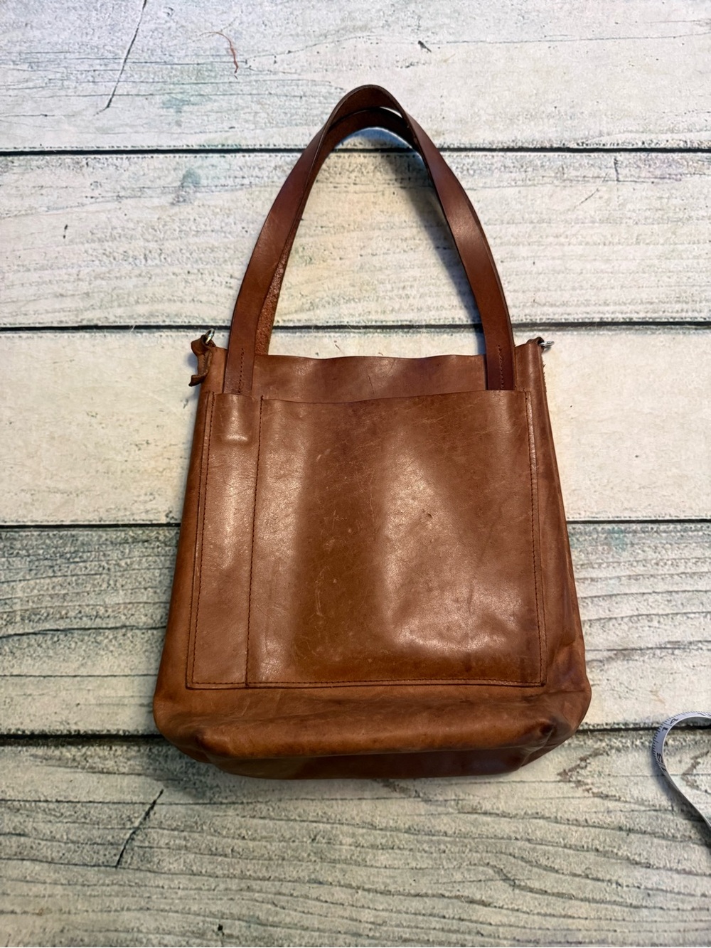 Small leather brown tote purse bag.